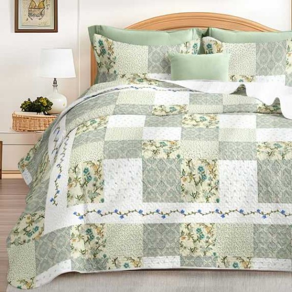 A pure cotton embroidered quilted patchwork bedding set