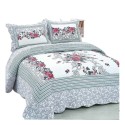 An elegant floral bedspread and quilt set