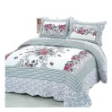 An elegant floral bedspread and quilt set