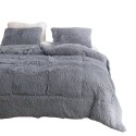 A grey plush warm bedding set