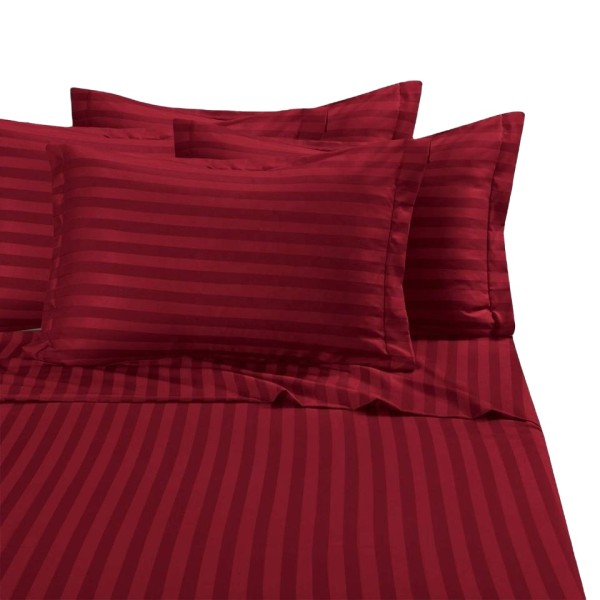 A striped cotton bedspread and sheet set