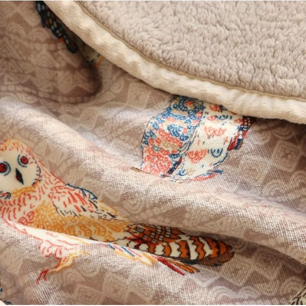 A warm, printed lambswool throw blanket