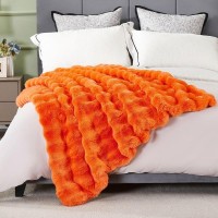 A fluffy, soft, and warm faux-fur blanket