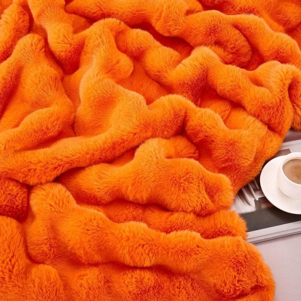 A fluffy, soft, and warm faux-fur blanket