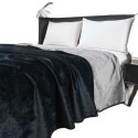 A waterproof fleece-lined bed blanket