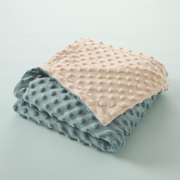 A skin-friendly double-layered quilted blanket with edging
